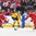 BUFFALO, NEW YORK - DECEMBER 26: Sweden's  Marcus Davidsson #10 skates with the puck against Vladislav Sokolovski #4 and Vladislav Mikhalchuk #21 of Team Belarus  during the preliminary round of the 2018 IIHF World Junior Championship. (Photo by Andrea Cardin/HHOF-IIHF Images)

